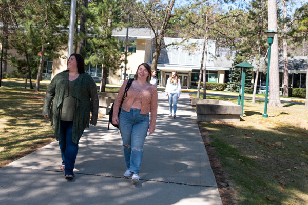 Students walking outside on Marinette Campus