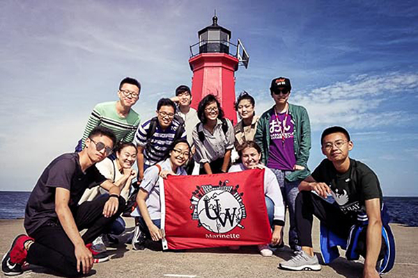 International students visiting the Marinette lighthouse