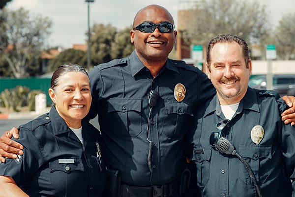 Smiling multicultural police officers