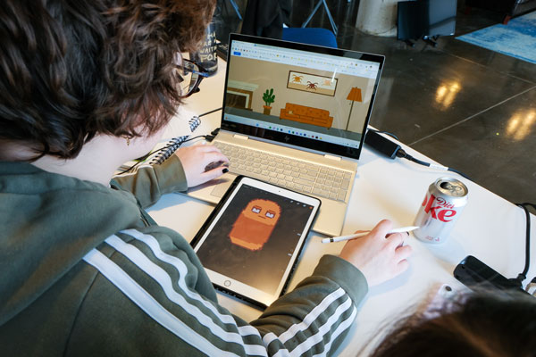 Student develops digital game graphics on computer