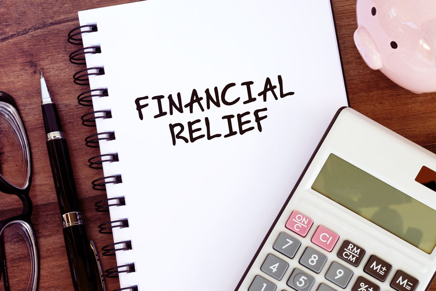Financial Relief" written on notebook