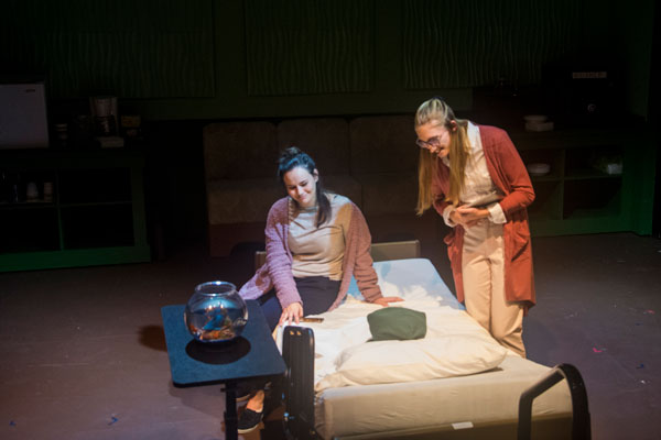 Actresses sit on hospital bed in Mary Jane performance