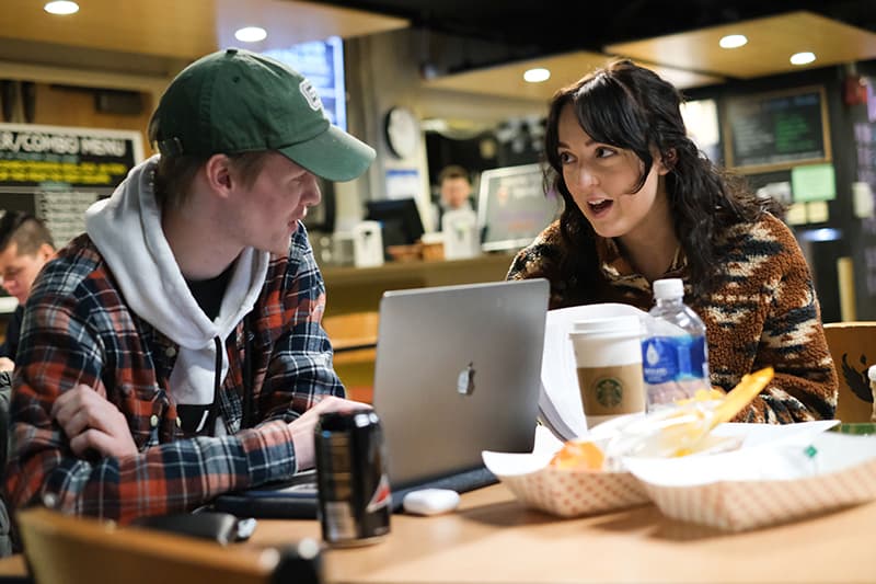 students chatting with each other in the UWGB University Union Phoenix Club