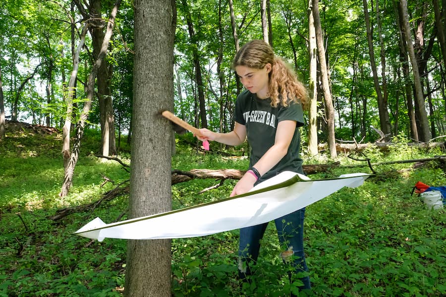 UWGB student doing field research