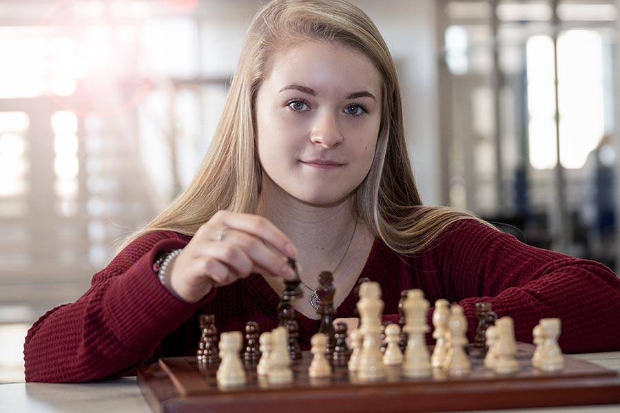 UW-Green Bay student Alyson Hanson playing chess in the STEM Center