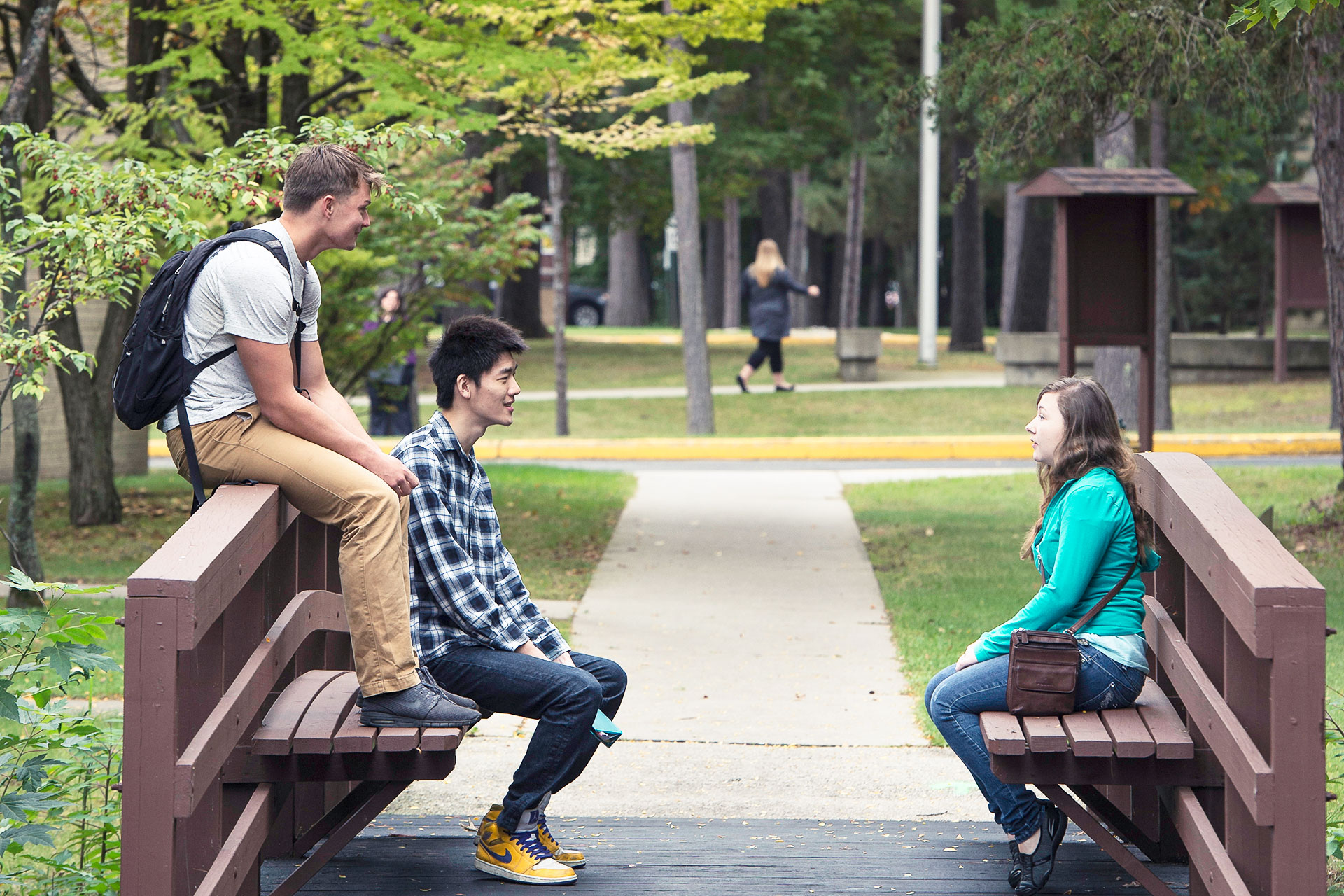 Students sitting on benches in Marinette