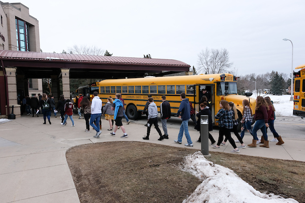 Students get off of buses for Sophomore Visit Day at UW-Green Bay.