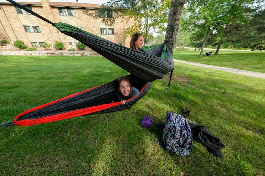 uwgb students hanging out in hammocks