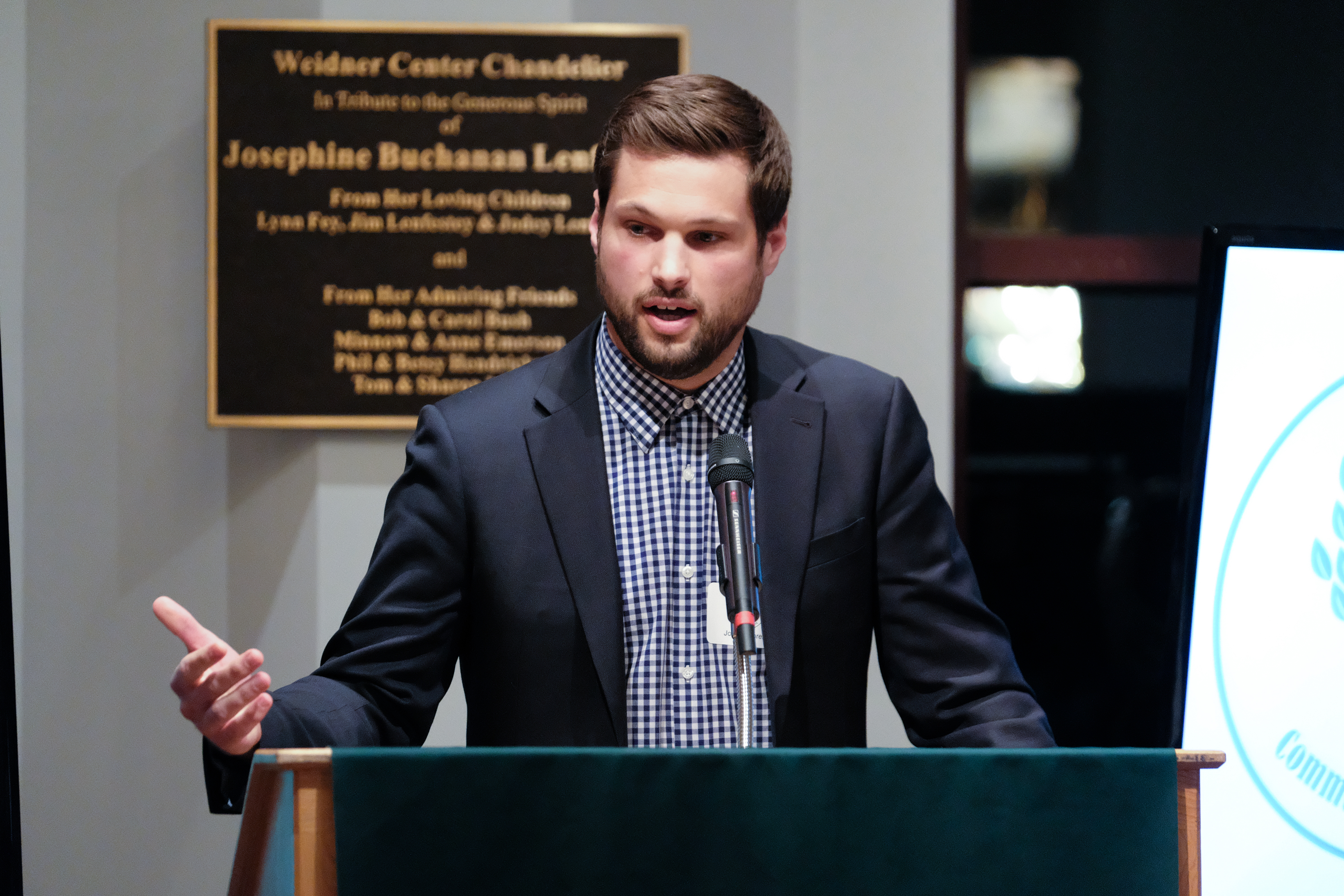 student speaking at communication week
