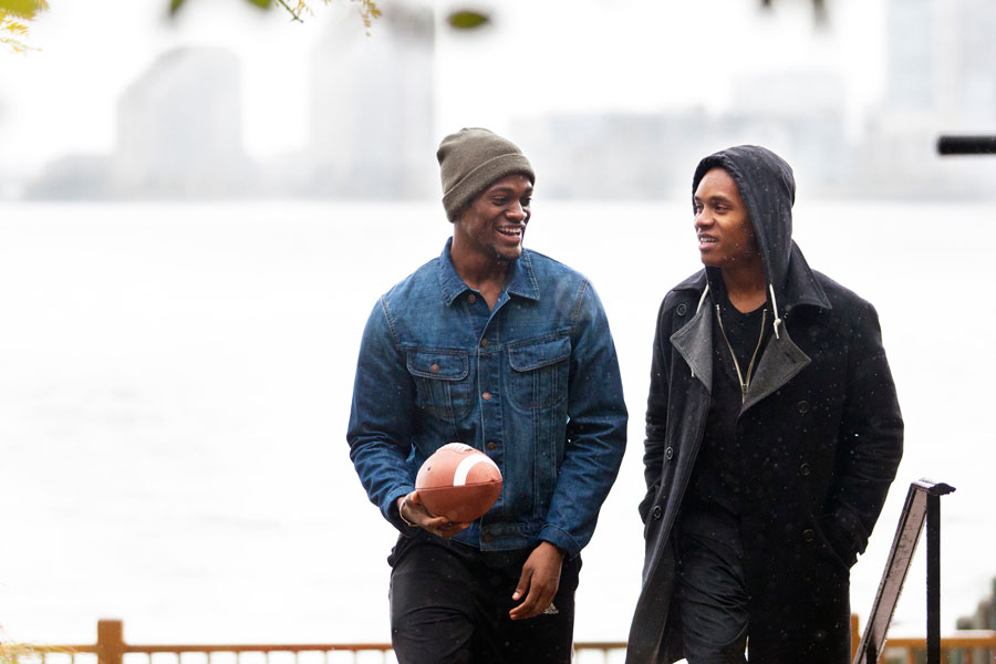 Two African American males take a walk in the park