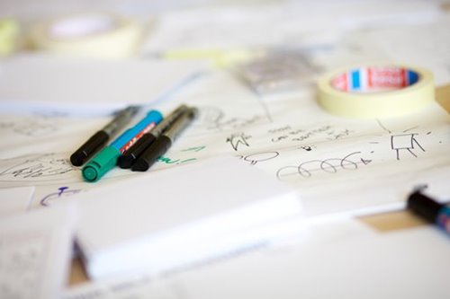 Markers, tape, and index cards during a brainstorming session