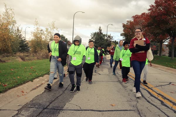 Elementary students explore University of Wisconsin Green Bay with Community Health student