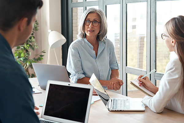 mature woman mentoring team