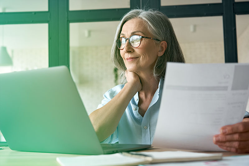 Smiling mature woman continuing her education