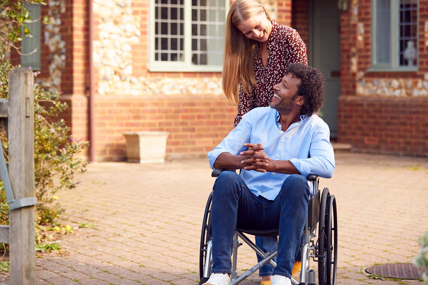 Caregiver with client outside