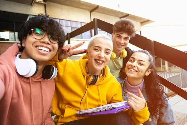 Group of students hanging out outside