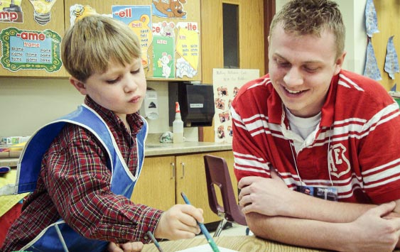 Education student Kyle student teaching at an elementary school