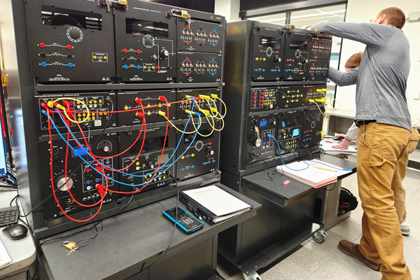 Male student works on electrical machine in TEAM Lab