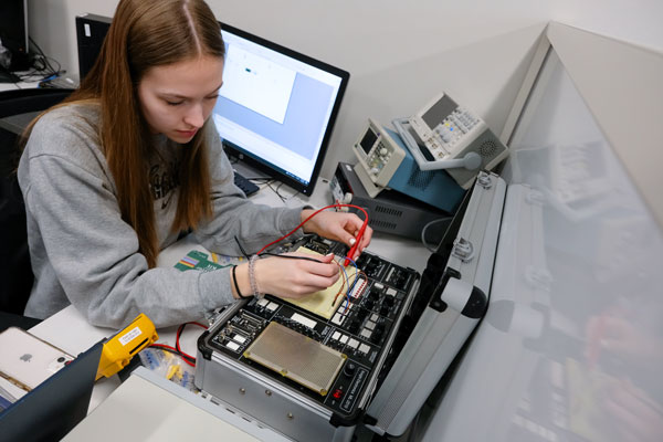 Female student works on project