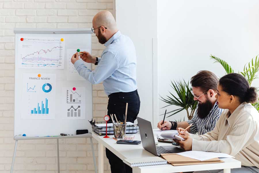 Employees work on financial planning at the office
