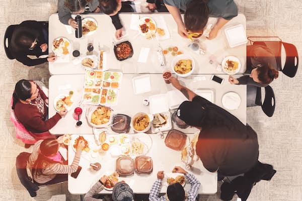 Indigenous students enjoy a group meal