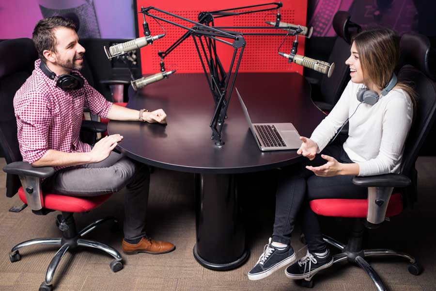 Two students during a radio broadcast