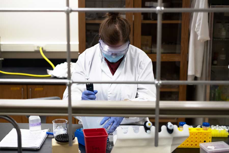 Female student works in lab