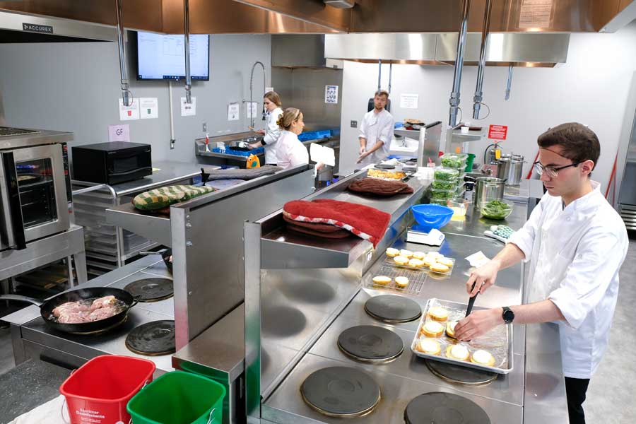 Students work in STEM Center kitchen