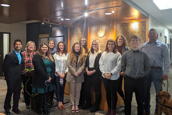 Students with Phoenix Leadership Program pose for photo