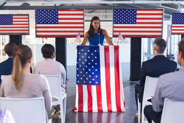 Female politician speaks to crowd