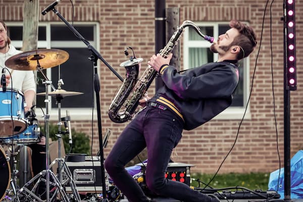 Saxophone player performs on stage