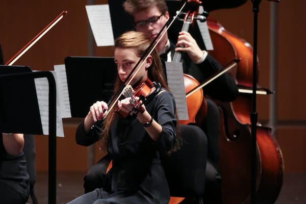 Students perform for string ensemble