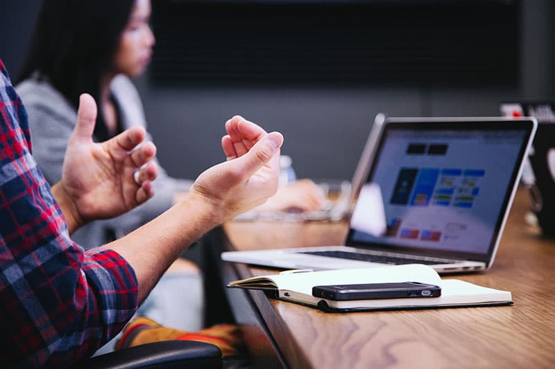 closeup of hands during meeting
