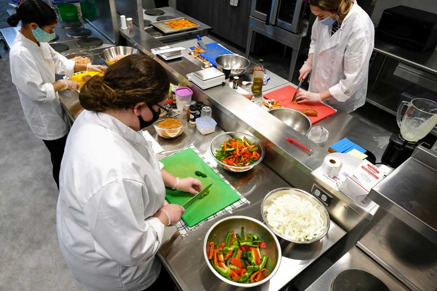 UWGB Dietetic interns working in an industrial kitchen
