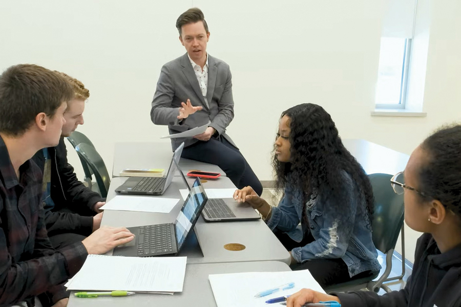 Students talking to each other during a debate