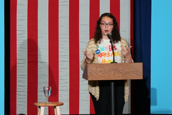 Student gives speech at political rally