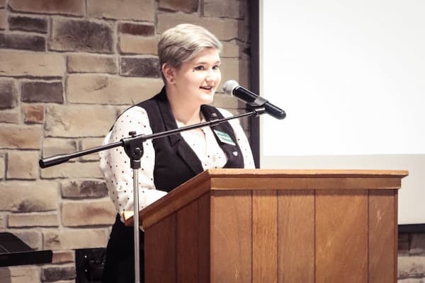 Student gives speech at Pass the Gavel event