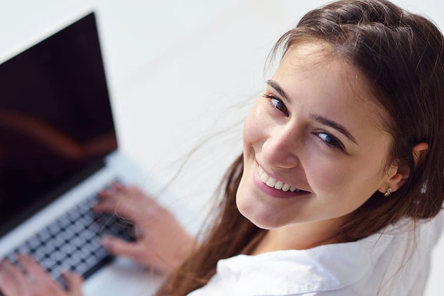 Female student studies online