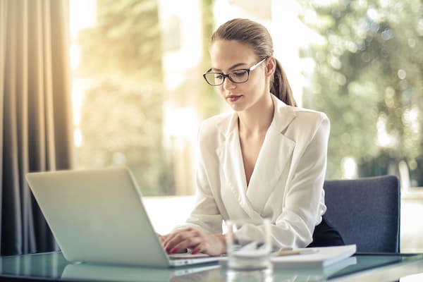 Woman works at desk