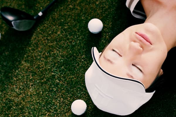 Female golfer meditates