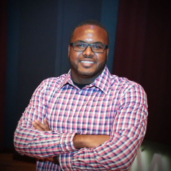 Lorenzo Lones posing for photo after TEDx Talk