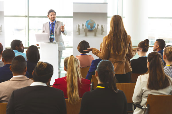 Group of people attend global conference