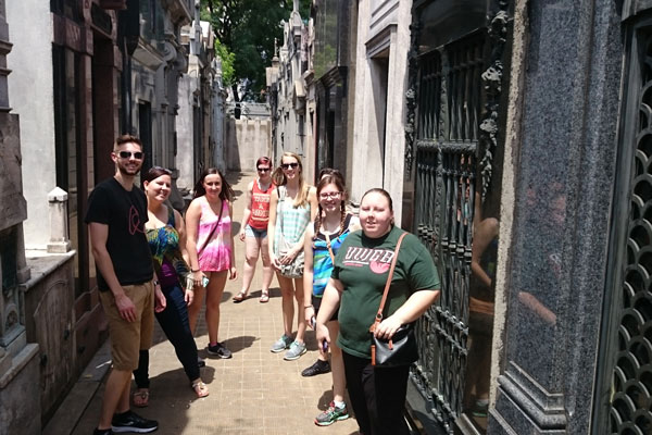 Students studying abroad pose for photo in the city