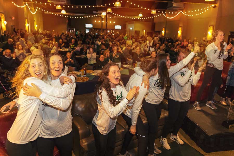 UWGB girls basketball team celebrates a tournament selection