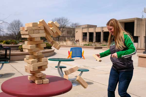 Student employee playing Janga at employee appreciation event