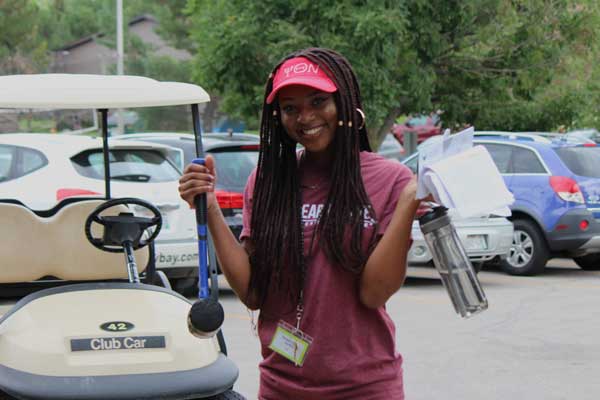 Student employee poses for photo