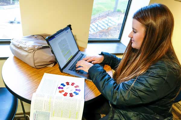 Female student attends class online