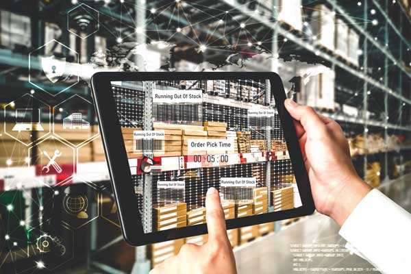 Employee tracks supply on tablet