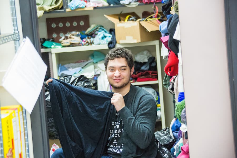 Student volunteering in the CK One campus closet