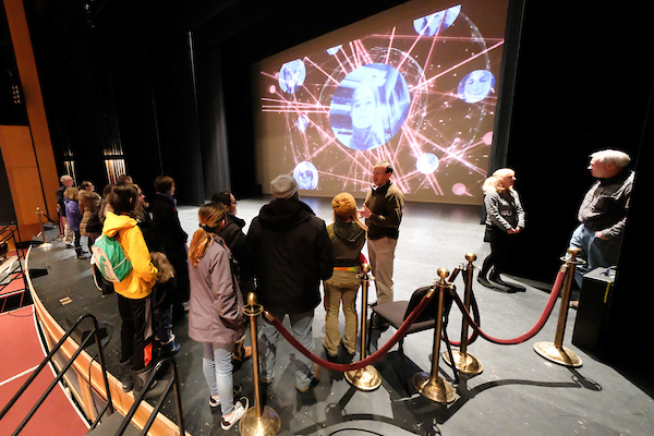 Class touring a science presentation at the Weidner Center.